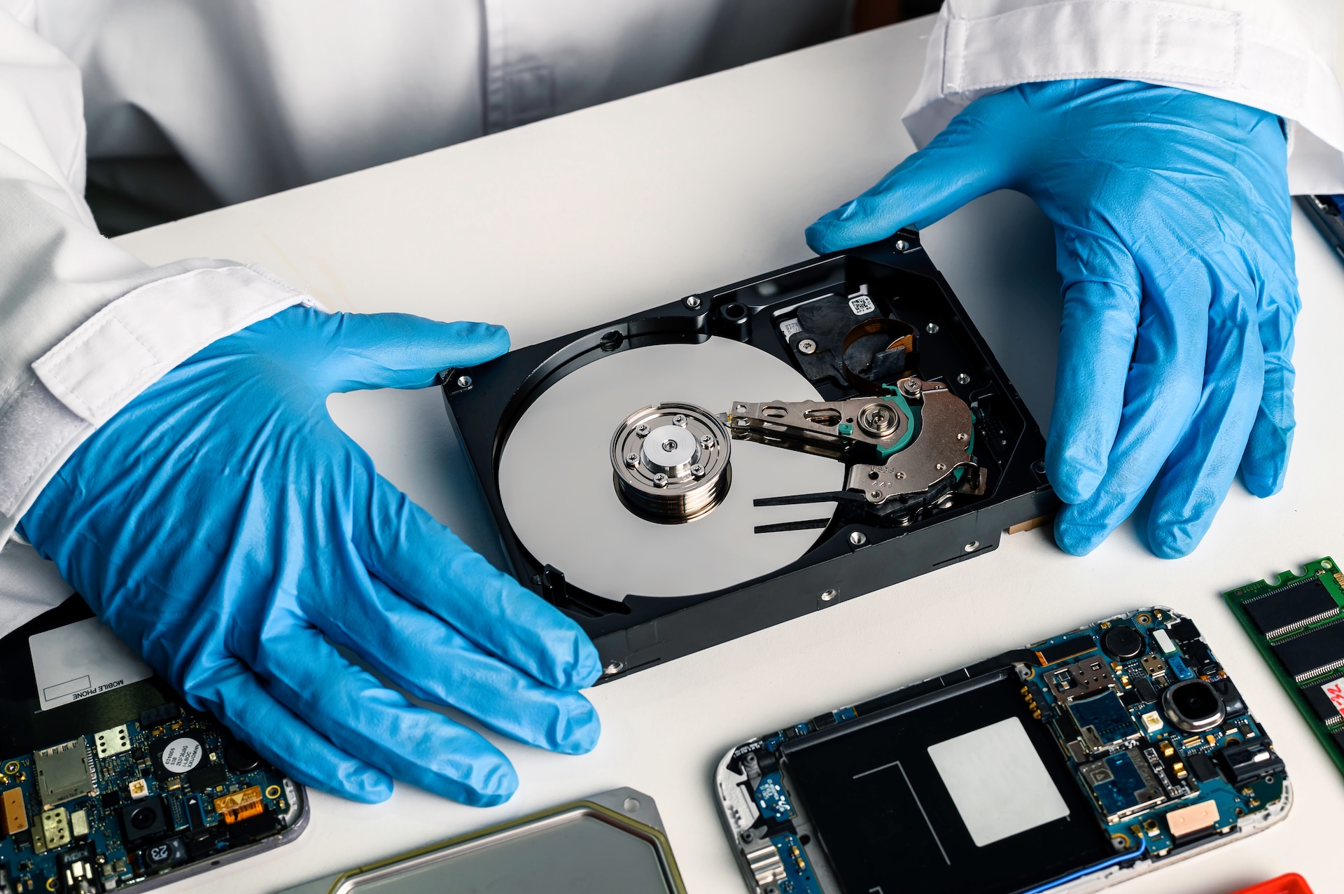 Photo of internal components of a a hard disk drive (HDD). If your data is trapped, we can help you get it back.